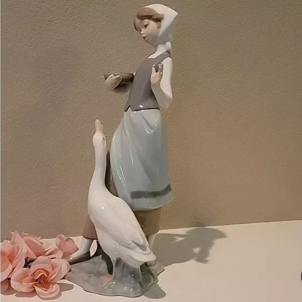 VINTAGE 1969 “Girl With Duck" LLADRO 
PRICE IS FIRM